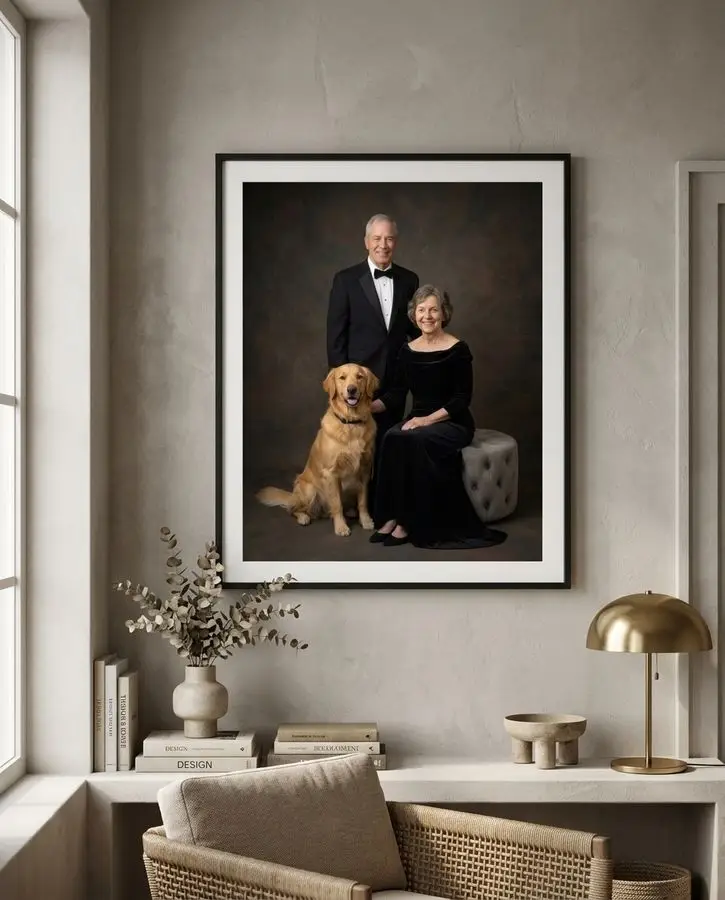 An older couple dressed in formal black attire poses alongside a golden retriever against a dark textured background.